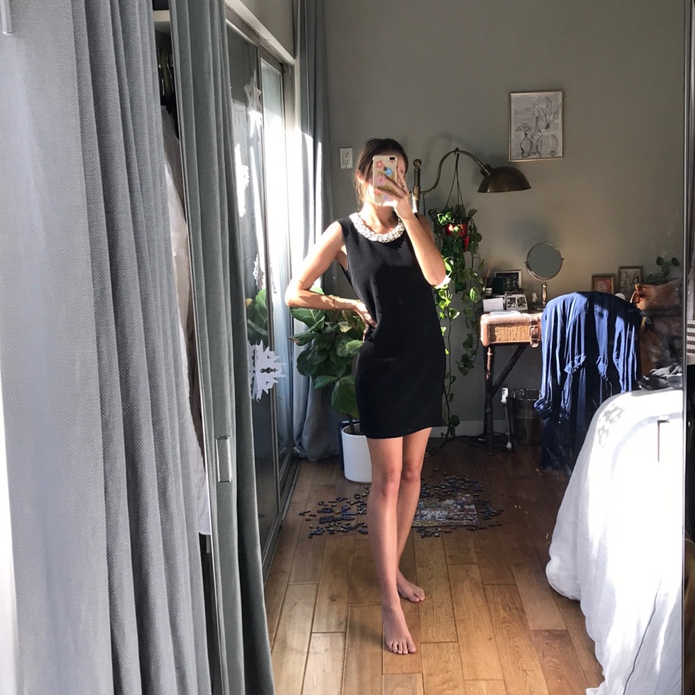 Black dress with pearl neck detailing